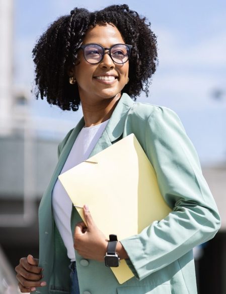 Vertical outdoor shot of beautiful african american business woman
